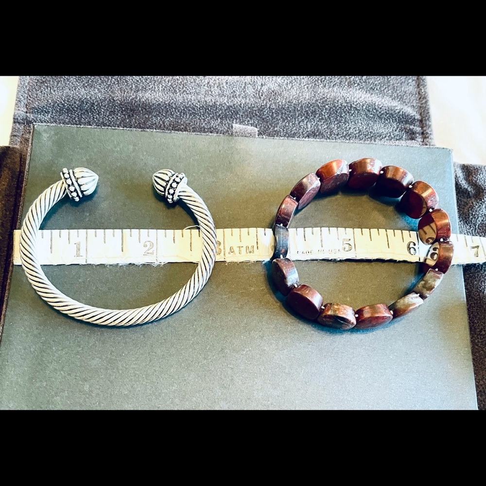 Two bracelets - one claw, one stretch